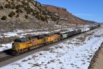 UP 9049, 7109 (SD70ACE, C44ACM) lead a westbound manifest approaching the Echo Rd. OHB in Emory, Utah. February 19, 2022 {Winter Echofest}